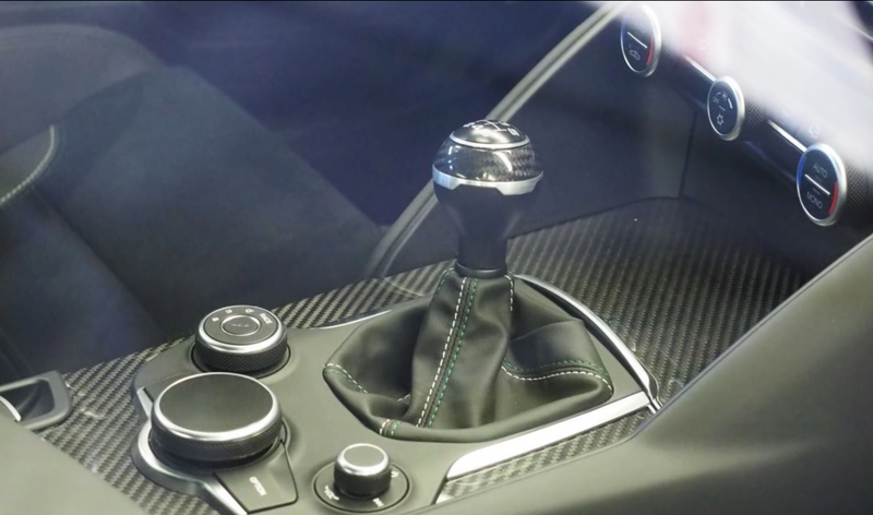 Illustration for article titled The New Alfa Romeo Giulia's Interior Is A Carbon Fiber Wonderland